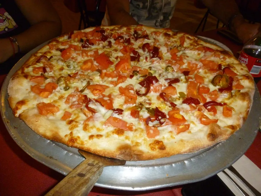 Pizza with fresh tomatoes
