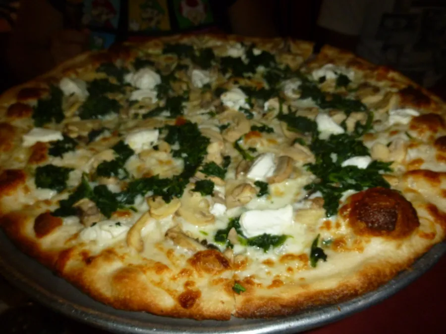 White pizza with spinach and ricotta